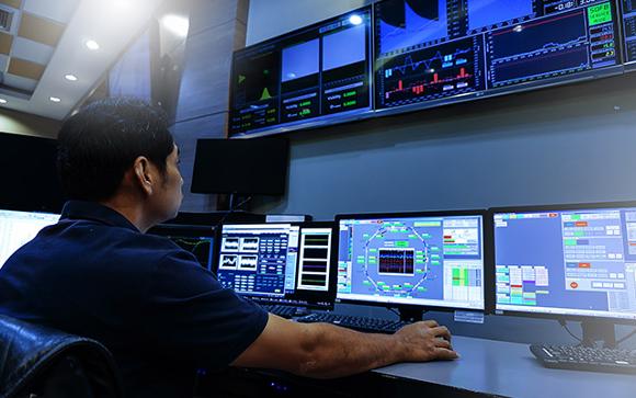 Engineering recruitment - controls and automation. Man working on a control system.